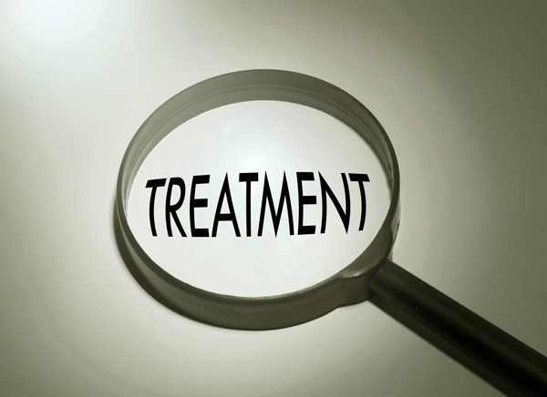 choosing treatment options - magnifying glass searching treatment - great oaks recovery center